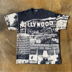 VTG 90s AOP Hollywood Wayne Samuel All Over Print Graphic T-Shirt